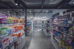 agencement_de_pharmacie_gondole_centrale_etagere_verre